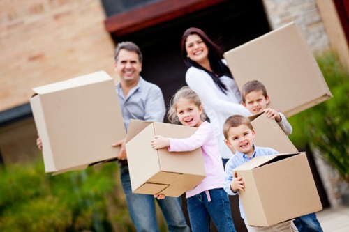 Household items being carefully packed into a removals truck