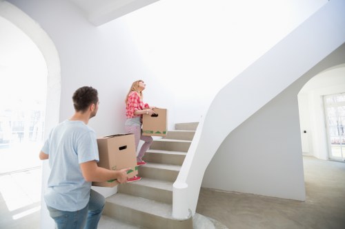 Crew loading furniture into a moving truck for a flat move