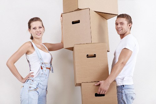 Packed boxes and furniture ready for removal service collection