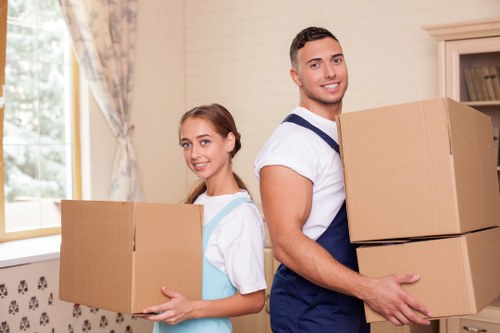 Furniture and boxes being unloaded during a Boundsgreen move