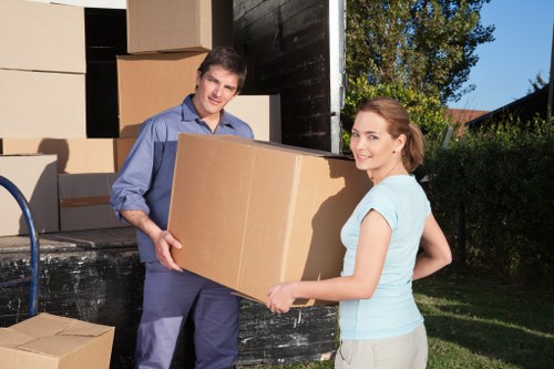 Packed boxes and furniture ready for local flat removal